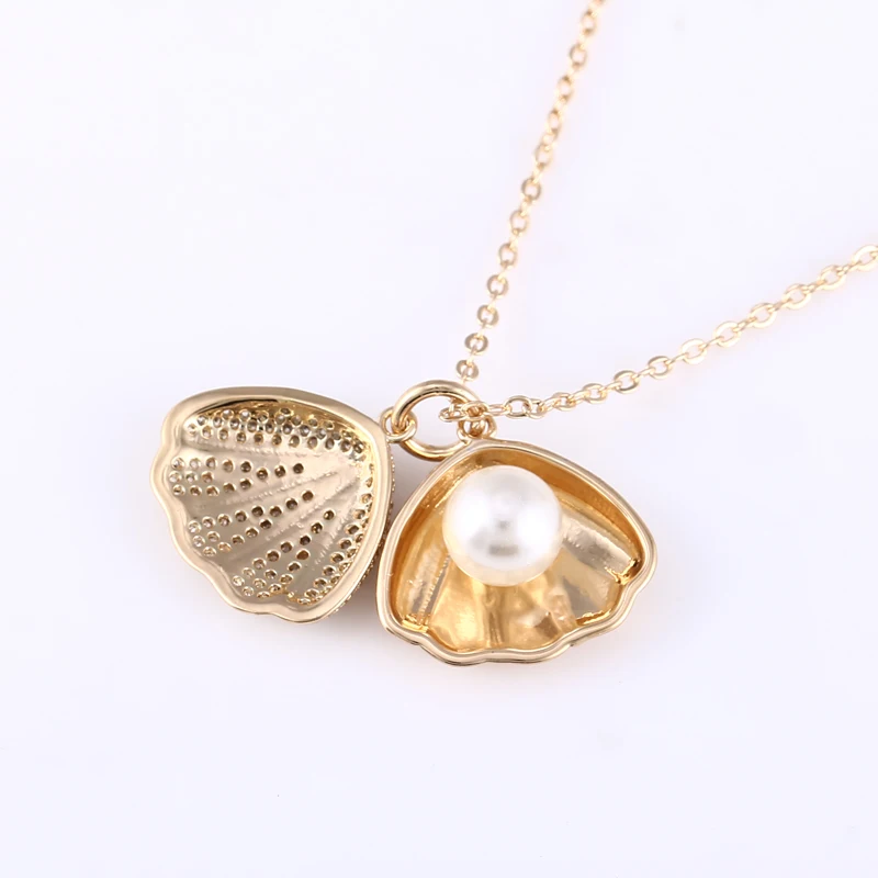 2017 New Statement handmade copper jewellery Micro Pave Zircon Shell Pearl Cage Pendant Drop Charms For Women Girls Nice Gift
2017 New Statement handmade copper jewellery Micro Pave Zircon Shell Pearl Cage Pendant Drop Charms For Women Girls Nice Gift