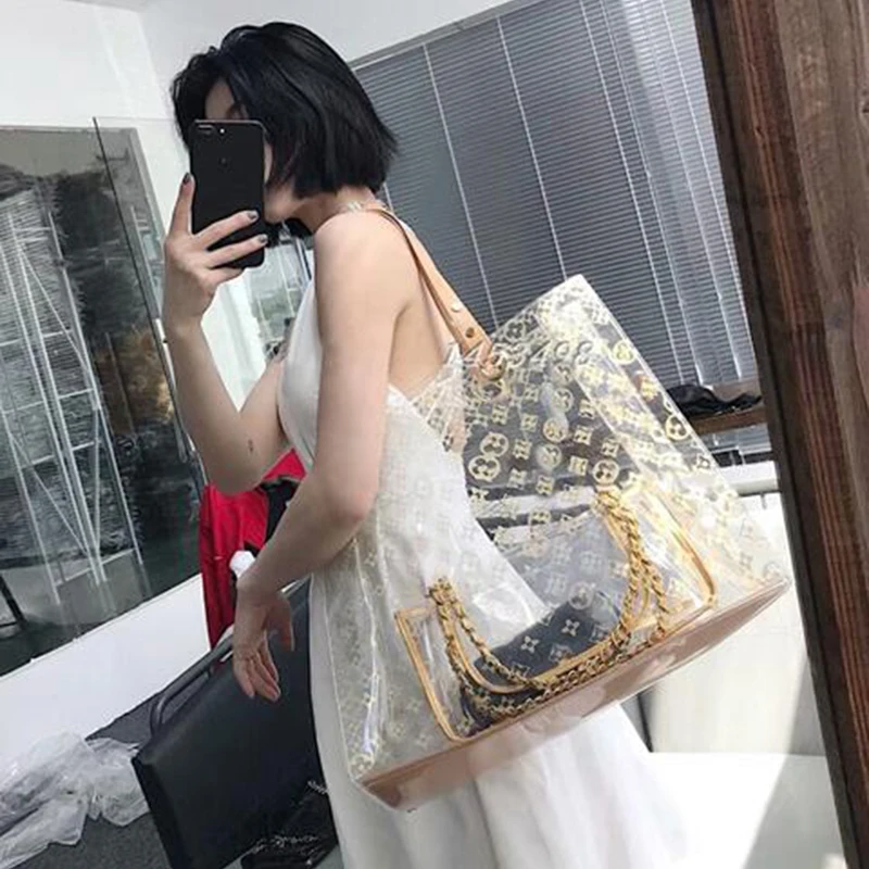Transparent bag female 2019 new summer small ck net red large capacity portable slung PVC jelly package
Transparent bag female 2019 new summer small ck net red large capacity portable slung PVC jelly package