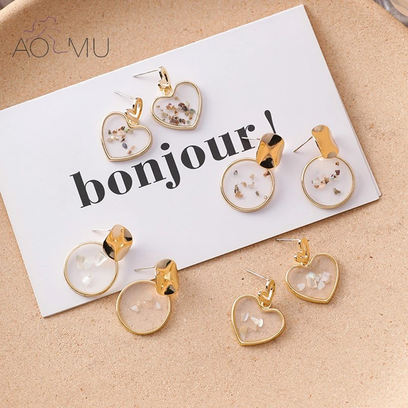 AOMU 2019 Korea Transparent Sweet Geometric Circle Love Heart Shell Round Wave Point Stud Earrings for Women Wedding Jewelry
AOMU 2019 Korea Transparent Sweet Geometric Circle Love Heart Shell Round Wave Point Stud Earrings for Women Wedding Jewelry