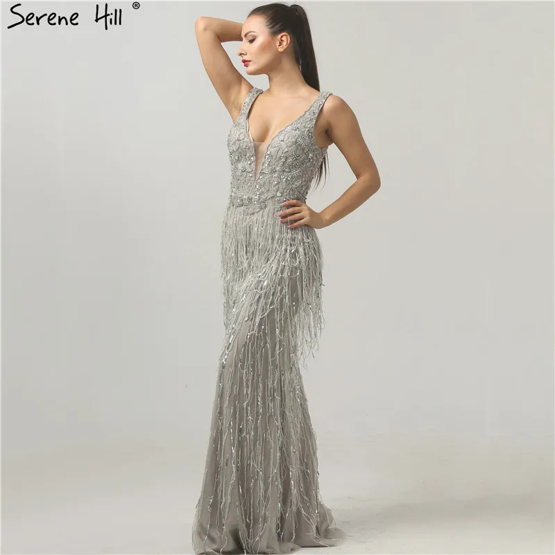 BeaV-Neck MermaidBeading Evening Dresses Tassel Shaking Beading Tulle Fashion Luxury Sexy Formal Evening Gown 2019 LA6104
BeaV-Neck MermaidBeading Evening Dresses Tassel Shaking Beading Tulle Fashion Luxury Sexy Formal Evening Gown 2019 LA6104