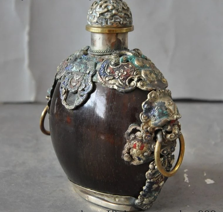 Collect Old Chinese Ox Horn Inlay tibet silver Cloisonne Beast Head snuff bottle 
Collect Old Chinese Ox Horn Inlay tibet silver Cloisonne Beast Head snuff bottle