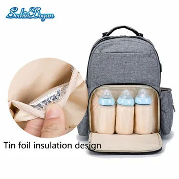 Baby Diaper Bag Multifunctional USB Charging Diaper Bag Backpack Large Capacity Travel Solid Colour Nappy Backpacks
Baby Diaper Bag Multifunctional USB Charging Diaper Bag Backpack Large Capacity Travel Solid Colour Nappy Backpacks