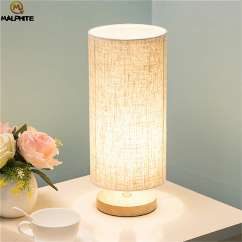 Modern Linen LED Table lights Living Room Lamps Table Fixtures Table lamp Bedroom Bedside Lamp Wood Home Decor simple desk lamp
Modern Linen LED Table lights Living Room Lamps Table Fixtures Table lamp Bedroom Bedside Lamp Wood Home Decor simple desk lamp