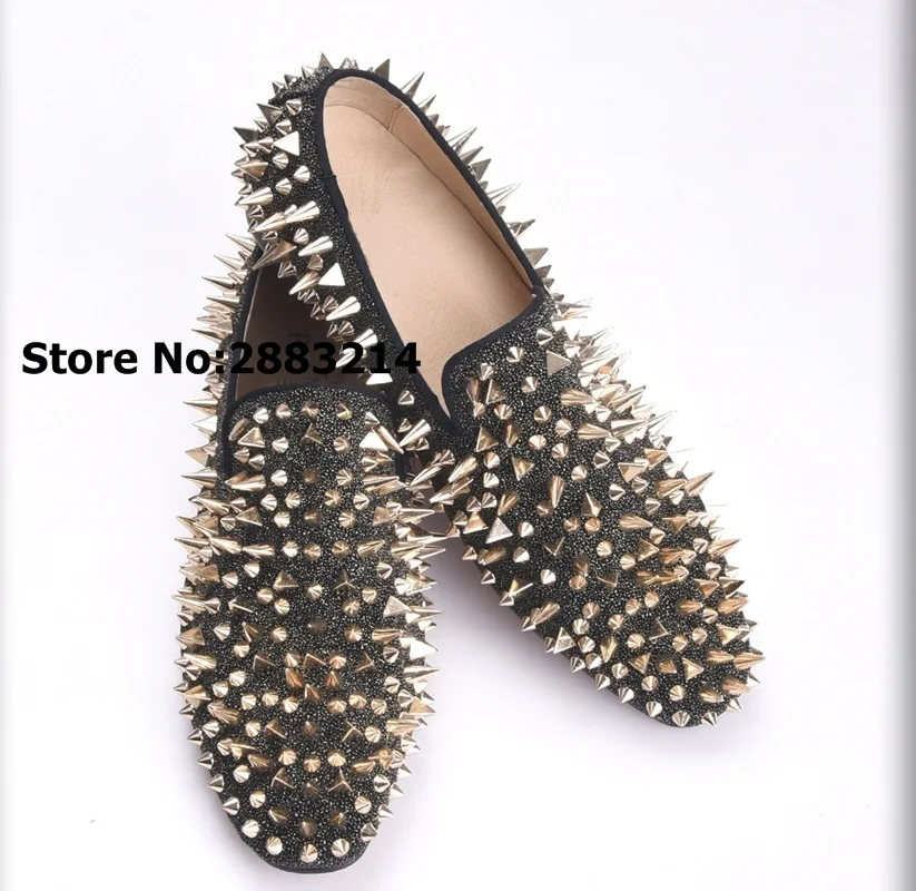 black dress shoes with gold spikes
