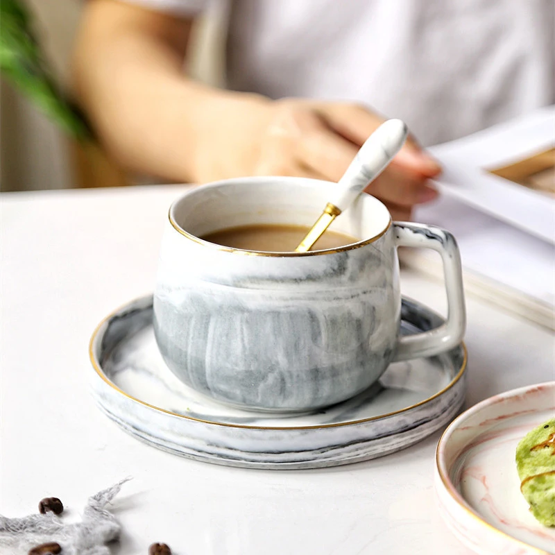 Nordic simple marble coffee cup saucer breakfast cup set English afternoon tea ceramic flower tea cup saucer with spoon milk mug
Nordic simple marble coffee cup saucer breakfast cup set English afternoon tea ceramic flower tea cup saucer with spoon milk mug