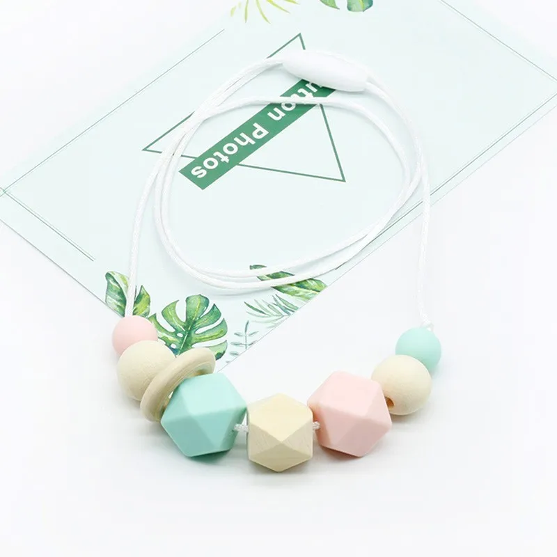 Teething Silicone Nursing Necklace Baby Chewing Jewelry Teether Toys Infants Food Grade Colares Grandes Mulher Baby Teether
Teething Silicone Nursing Necklace Baby Chewing Jewelry Teether Toys Infants Food Grade Colares Grandes Mulher Baby Teether