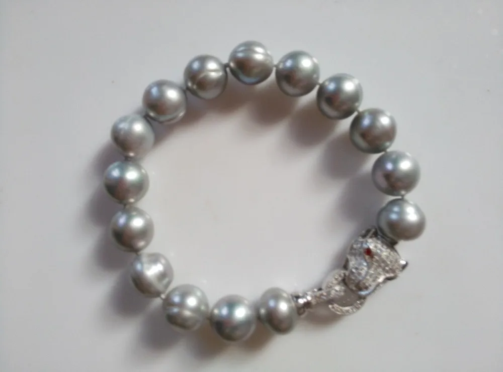 Free Shipping >>>>>New Style Leopard Head 10-11MM SOUTH SEA Grey Natural Pearl Bracelets
Free Shipping >>>>>New Style Leopard Head 10-11MM SOUTH SEA Grey Natural Pearl Bracelets