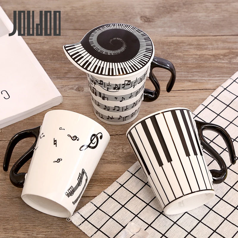 JOUDOO Creative Music Ceramic Cup Stave Note Piano Key Board Shape Handle Coffee Tea Ceramics Mug with Lid Unique Gifts 35
JOUDOO Creative Music Ceramic Cup Stave Note Piano Key Board Shape Handle Coffee Tea Ceramics Mug with Lid Unique Gifts 35