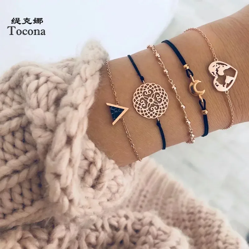 Tocona 5pcs/sets Bohemian Map Moon Bracelets for Women Gold Color Hollow Heart Triangle Chain Bangles Jewelry браслет7123
Tocona 5pcs/sets Bohemian Map Moon Bracelets for Women Gold Color Hollow Heart Triangle Chain Bangles Jewelry браслет7123