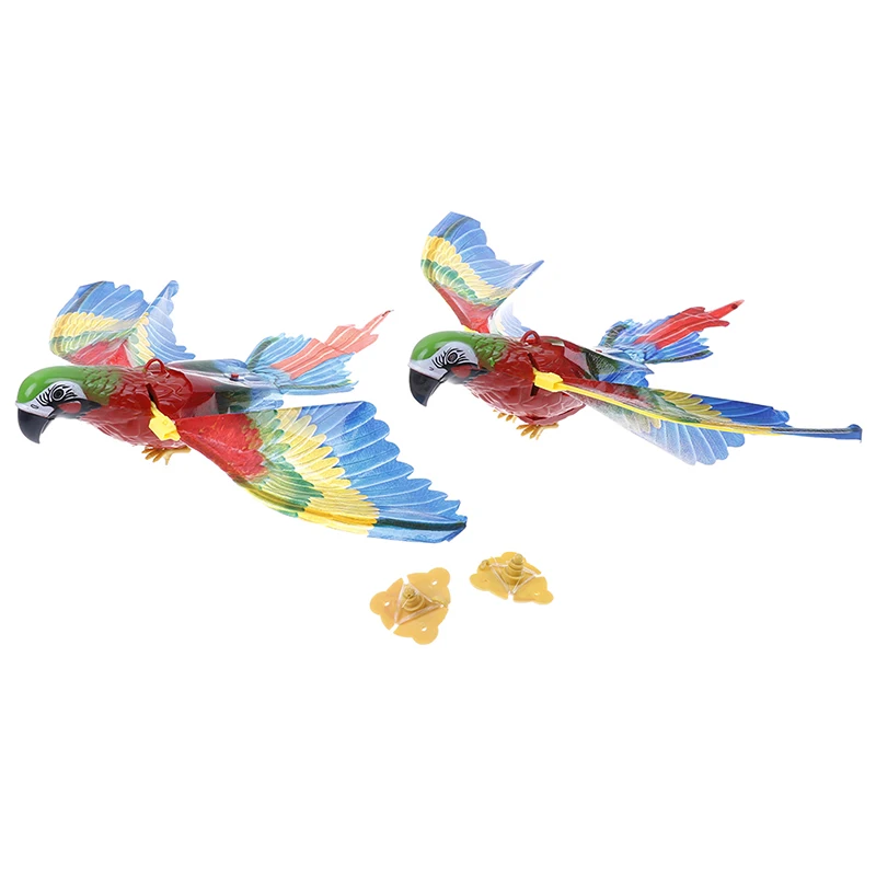 Фото Красочная игрушка для попугая пластиковая электрическая с крыльями говорящая