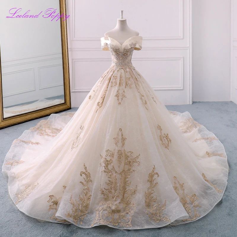 Glamorous Lace Appliques Off the Shoulder Crystal Beaded Wedding Dresses Long Vestido de novia Bridal Gowns Corset Back
Glamorous Lace Appliques Off the Shoulder Crystal Beaded Wedding Dresses Long Vestido de novia Bridal Gowns Corset Back