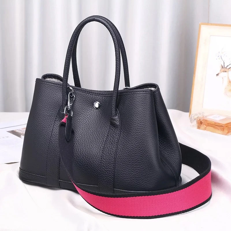 2018 100% genuine leather luxury women Tote bag famous brand garden party handbag Casual Cowhide Lady shoulder bag Top Handle
2018 100% genuine leather luxury women Tote bag famous brand garden party handbag Casual Cowhide Lady shoulder bag Top Handle