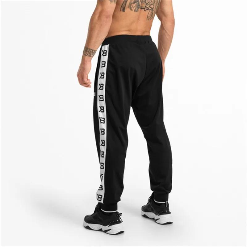 2019 Sweatpants Men Joggers Gyms Pants Men streetwear hip hop trousers Men's Sweatpants Pantalon Homme Sporting Pants
2019 Sweatpants Men Joggers Gyms Pants Men streetwear hip hop trousers Men's Sweatpants Pantalon Homme Sporting Pants