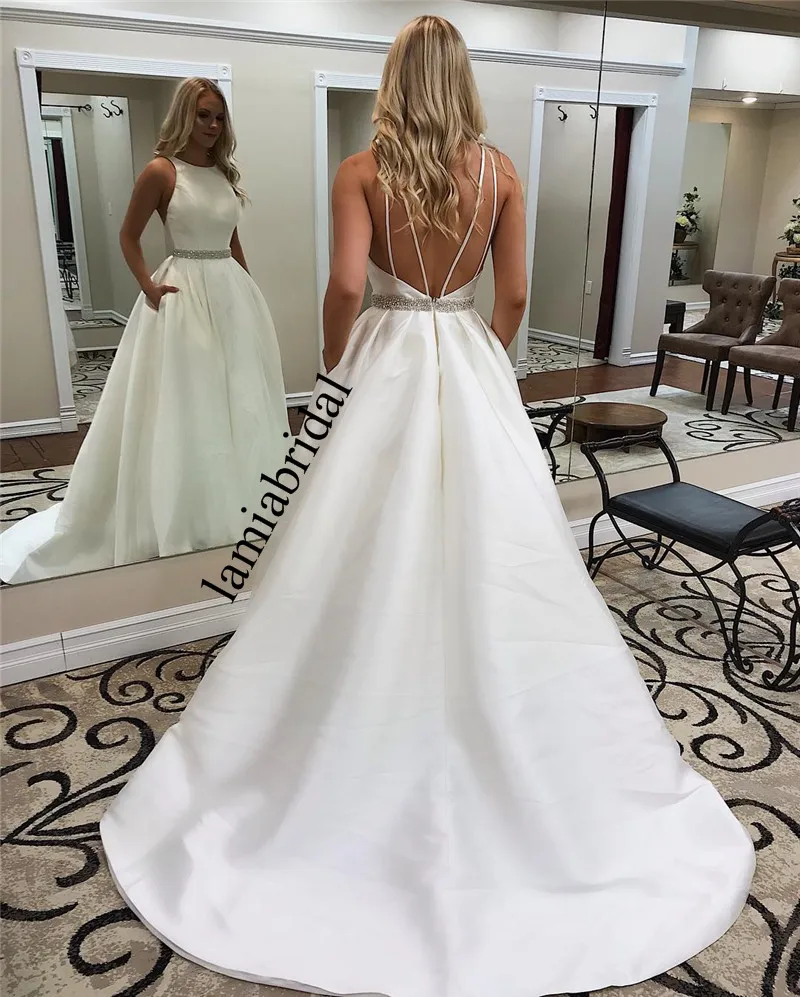 Sexy White Backless Cheap Country Wedding Dresses 2019 A Line Crystals Sash Pocket Plus Size Boho Simple Vestido De Novia
Sexy White Backless Cheap Country Wedding Dresses 2019 A Line Crystals Sash Pocket Plus Size Boho Simple Vestido De Novia