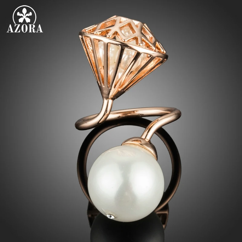 AZORA Rose Gold Color Big Simulated Pearl with Hollow Stone Net Filled with Tiny Pearls Adjustable Size Rings TR0218
AZORA Rose Gold Color Big Simulated Pearl with Hollow Stone Net Filled with Tiny Pearls Adjustable Size Rings TR0218