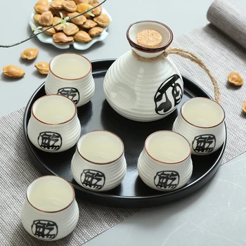 Chinese ceramic white wine set liquor pot tray distribution small bottle cup porcelain plate barware Japanese sake gift
Chinese ceramic white wine set liquor pot tray distribution small bottle cup porcelain plate barware Japanese sake gift