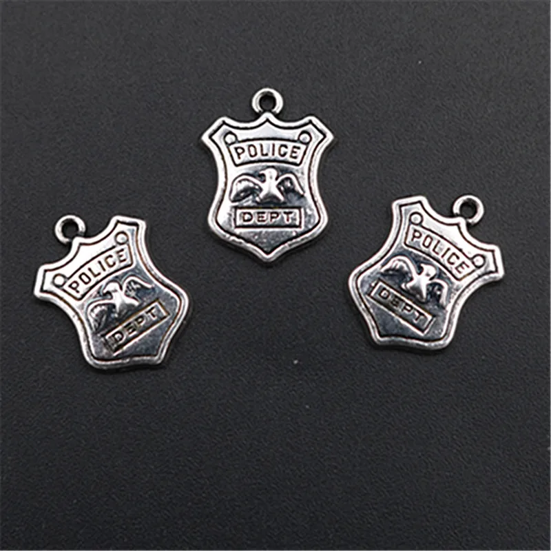 WKOUD 6pcs Antique Silver Metal Police Badge Charm Alloy Pendant Vintage Bracelet Necklace DIY Handmade Jewelry Findings A1600 
WKOUD 6pcs Antique Silver Metal Police Badge Charm Alloy Pendant Vintage Bracelet Necklace DIY Handmade Jewelry Findings A1600