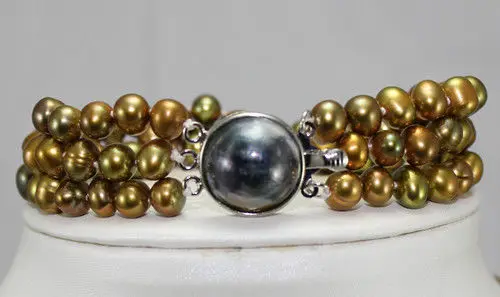 Wholesale price 16new ^^^^New Design 3 rows Two Colors Noble 8mm Goden Shell Pearl Clap Bracelet
Wholesale price 16new ^^^^New Design 3 rows Two Colors Noble 8mm Goden Shell Pearl Clap Bracelet