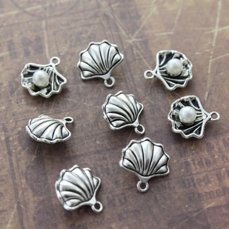 10/20pcs DIY Antique Silver Pearl in Shell Conch Charms Pendants Nautical Jewelry Making Dangle 15*15mm
10/20pcs DIY Antique Silver Pearl in Shell Conch Charms Pendants Nautical Jewelry Making Dangle 15*15mm