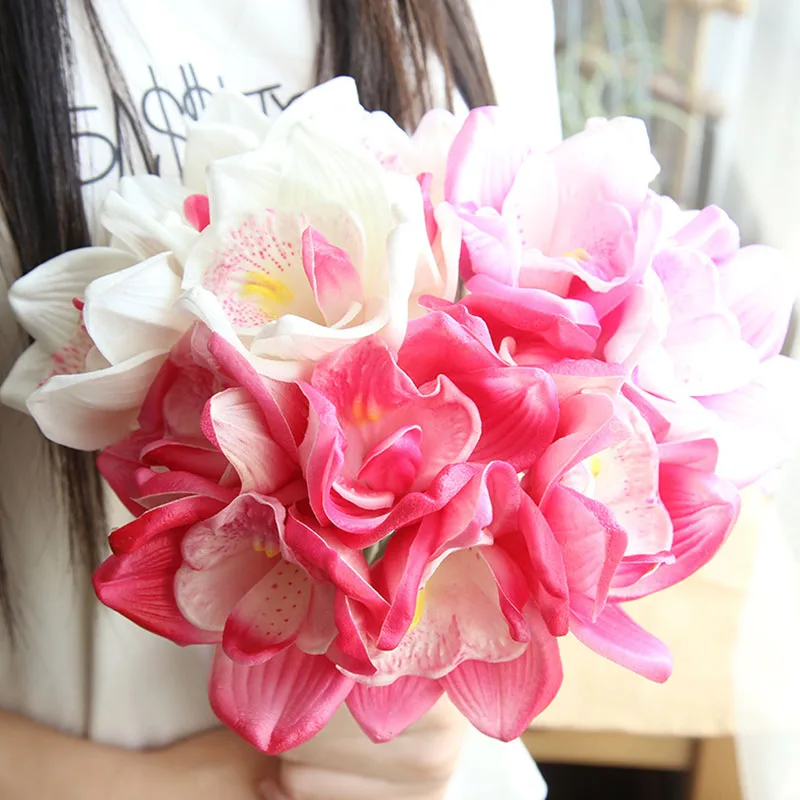 6 Heads Real Touch Artificial Orchids PU Cymbidium Magnolias Bouquet Fake Flowers for DIY Wedding Bride Hand Flowers Home Decor
6 Heads Real Touch Artificial Orchids PU Cymbidium Magnolias Bouquet Fake Flowers for DIY Wedding Bride Hand Flowers Home Decor