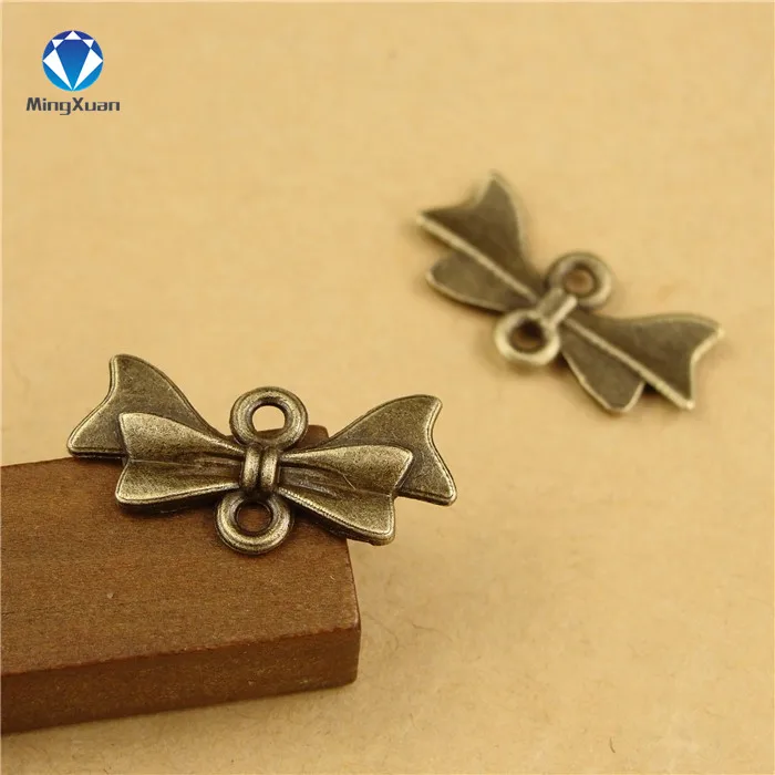 MINGXUAN 50pcs 21x10mm Charms Bow Tie Connectors Pendant Antique bronze Zinc Alloy Fit Bracelet Necklace DIY Jewelry Findings
MINGXUAN 50pcs 21x10mm Charms Bow Tie Connectors Pendant Antique bronze Zinc Alloy Fit Bracelet Necklace DIY Jewelry Findings