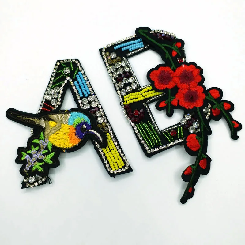 1pc letter Handmade rhinestone beaded Patches for clothes Sew on sequins patch Applique embroidered flower parches bordados para
1pc letter Handmade rhinestone beaded Patches for clothes Sew on sequins patch Applique embroidered flower parches bordados para