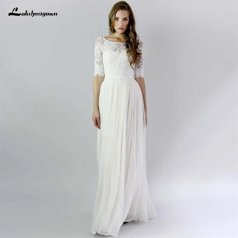 Vintage Half Sleeve Beach Wedding Dresses Lace A Line Boho Bridal Gown Floor Length Button Back Vestido de noiva
Vintage Half Sleeve Beach Wedding Dresses Lace A Line Boho Bridal Gown Floor Length Button Back Vestido de noiva