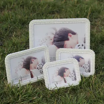 SUFEILE 1PC Picture frame european-style handmade pearl photo frame place on the table W31D20
SUFEILE 1PC Picture frame european-style handmade pearl photo frame place on the table W31D20