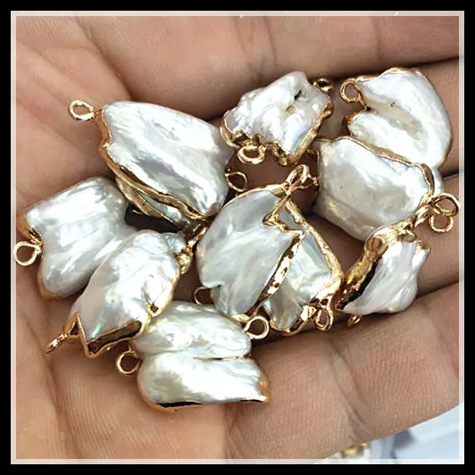 4 pieces nature biwa pearl cultured freshwater pearl connectors with golden color size 10-15mm white pearl good quality
4 pieces nature biwa pearl cultured freshwater pearl connectors with golden color size 10-15mm white pearl good quality