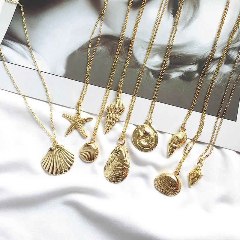 2019 New Fashion Gold Color Alloy Cowrie Shell Necklace for Women Conch Chain Pendant Necklace Summer Jewelry Starfish Collar
2019 New Fashion Gold Color Alloy Cowrie Shell Necklace for Women Conch Chain Pendant Necklace Summer Jewelry Starfish Collar