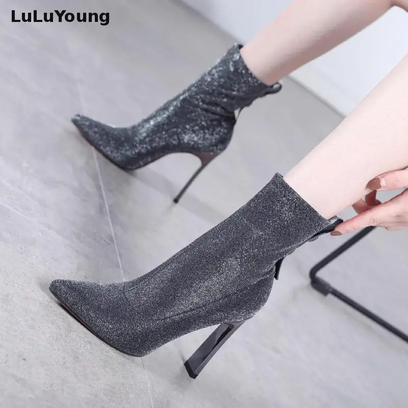 Fashion Sequins Medium Tube Elastic Boots 10 Cm High Heels Thin Boots Women Pointed Toe Martin Boots.
Fashion Sequins Medium Tube Elastic Boots 10 Cm High Heels Thin Boots Women Pointed Toe Martin Boots.