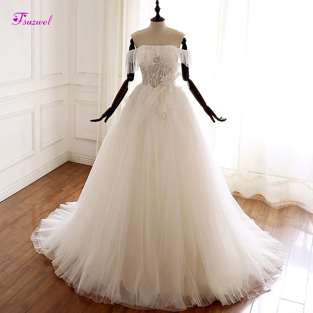 Fsuzwel New Arrival Luxury Appliques Beaded A-Line Wedding Dresses 2020 Sexy Boat Lace Up Off the Shoulder Bridal Gown Plus Size
Fsuzwel New Arrival Luxury Appliques Beaded A-Line Wedding Dresses 2020 Sexy Boat Lace Up Off the Shoulder Bridal Gown Plus Size