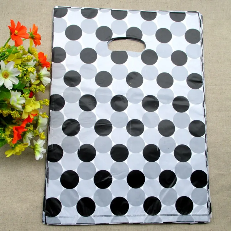 100pcs/bag 20*15cm Black dot designs Gift Bags Plastic Pouches Shopping Gift Package Bag 2035
100pcs/bag 20*15cm Black dot designs Gift Bags Plastic Pouches Shopping Gift Package Bag 2035