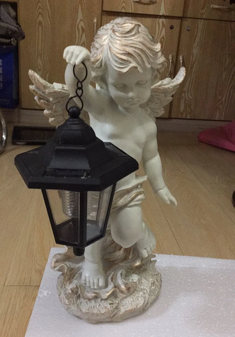 Garden outdoor furnishing creative angel solar lamp decoration villa garden sculpture glass steel park landscape.
Garden outdoor furnishing creative angel solar lamp decoration villa garden sculpture glass steel park landscape.