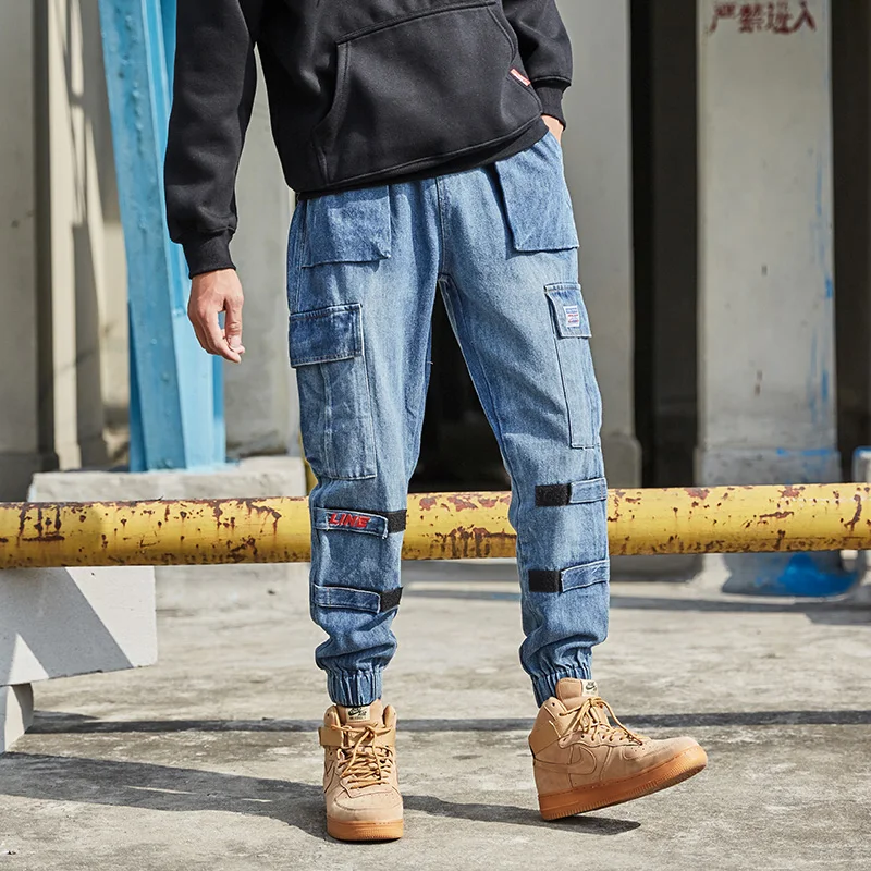 Fashion Streetwear Men Jeans Retro Blue Loose Fit Denim Cargo Pants Big Pocket Harem Jeans Men Designer Hip Hop Joggers Jeans 
Fashion Streetwear Men Jeans Retro Blue Loose Fit Denim Cargo Pants Big Pocket Harem Jeans Men Designer Hip Hop Joggers Jeans