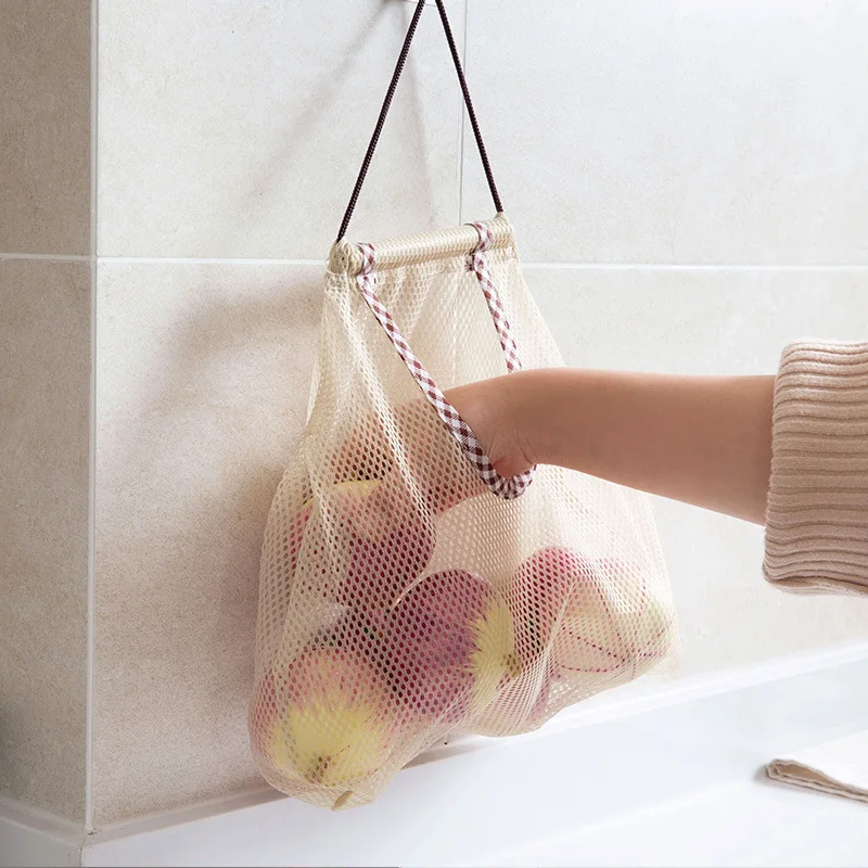 Kitchen vegetable net bag household multi-purpose creative fruit wall hanging bag can be hung up onion garlic storage
Kitchen vegetable net bag household multi-purpose creative fruit wall hanging bag can be hung up onion garlic storage