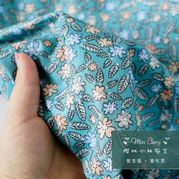 Rain forest secret floral check low-key blue-green floral cloth cloth pure cotton small floral clothing fabric
Rain forest secret floral check low-key blue-green floral cloth cloth pure cotton small floral clothing fabric