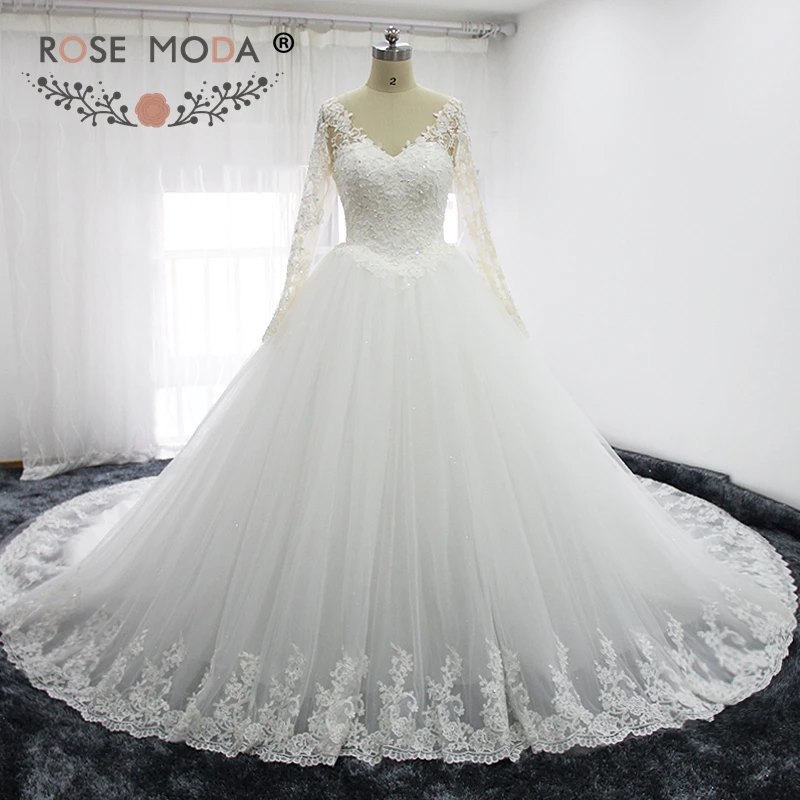 Rose Moda V Neck Long Sleeves Princess Wedding Dresses with Royal Train Illusion Lace Back Puffy Wedding Ball Gown
Rose Moda V Neck Long Sleeves Princess Wedding Dresses with Royal Train Illusion Lace Back Puffy Wedding Ball Gown