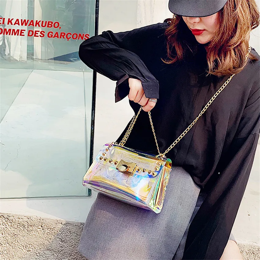 TOYOOSKY Women Summer Beach Bag PVC Clear Transparent Shoulder Bags Ladies Small Flap Bag Hologram Laser Rivet Handbags Brand
TOYOOSKY Women Summer Beach Bag PVC Clear Transparent Shoulder Bags Ladies Small Flap Bag Hologram Laser Rivet Handbags Brand