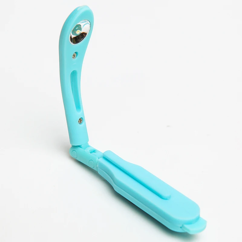 ABS environmental protection small book light portable LED eye travel reading light clip folding
ABS environmental protection small book light portable LED eye travel reading light clip folding