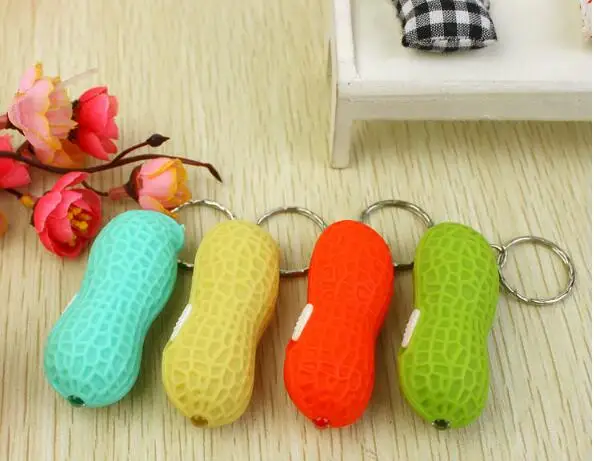 Trendy Toy Mini Simulation Peanut LED FlashLights Keychain Modeling Creative Lights LED Small Bag hanging Gift lin3722
Trendy Toy Mini Simulation Peanut LED FlashLights Keychain Modeling Creative Lights LED Small Bag hanging Gift lin3722
