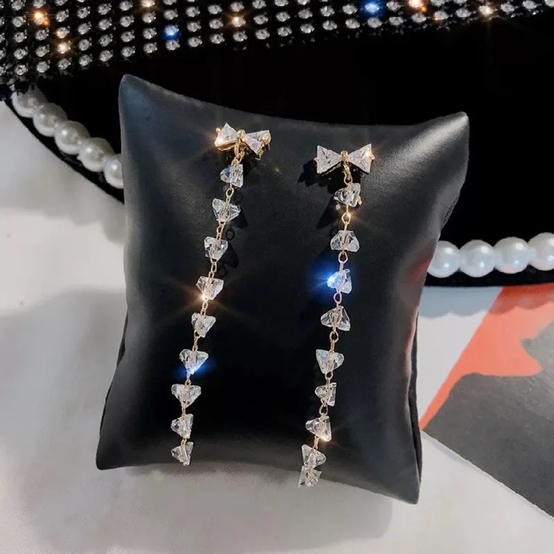 Fashion long temperament Korean bow knot ear nail lady temperament small fresh earrings
Fashion long temperament Korean bow knot ear nail lady temperament small fresh earrings