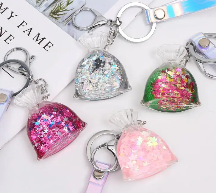Creative Glitter Purse Liquid Acrylic Keyring Quicksand Star Key Chain Backpack Pendant Couple Women Girlfriend Jewelry Gift
Creative Glitter Purse Liquid Acrylic Keyring Quicksand Star Key Chain Backpack Pendant Couple Women Girlfriend Jewelry Gift