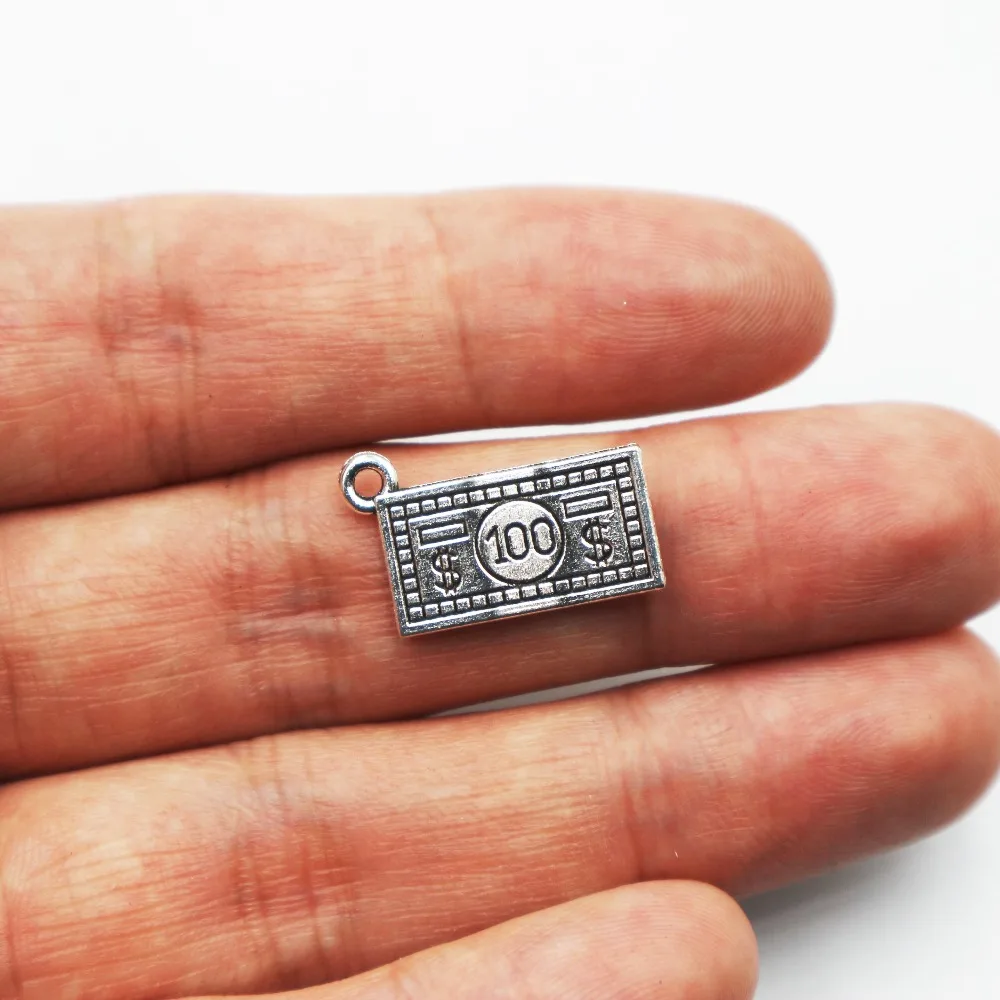 Hot sell 25pcs metal antique silver charms Dollar & Money charms pendant for necklace jewelry findings
Hot sell 25pcs metal antique silver charms Dollar & Money charms pendant for necklace jewelry findings