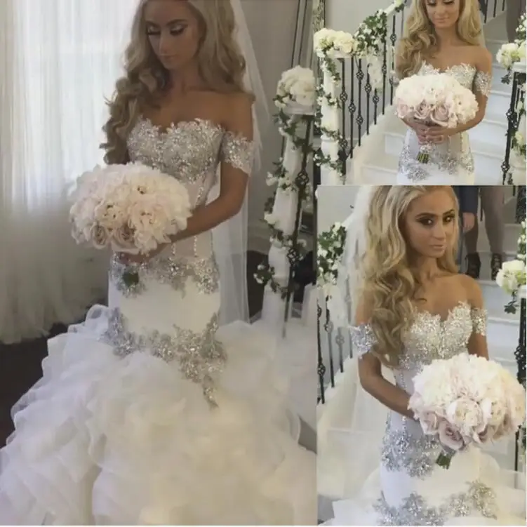 Saudi Arabia Bridal Gowns Sweetheart Neckline Lace Appliques Crystal Beading Tiered Mermaid Wedding Dresses Arabic
Saudi Arabia Bridal Gowns Sweetheart Neckline Lace Appliques Crystal Beading Tiered Mermaid Wedding Dresses Arabic