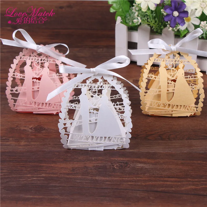 50pcs/lot Romantic Bride and Groom Laser Cut Candy Box With Ribbon Wedding Favors and Gifts Candy Bag Party Decoration
50pcs/lot Romantic Bride and Groom Laser Cut Candy Box With Ribbon Wedding Favors and Gifts Candy Bag Party Decoration
