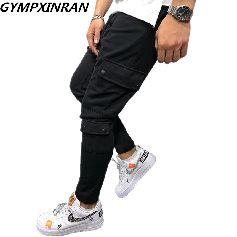 GYMPXINRAN 2019 Male Trousers Brand Men Pants Multi Pocket Harem Joggers Pants Mens Joggers Solid Pants Sweatpants M-3XL
GYMPXINRAN 2019 Male Trousers Brand Men Pants Multi Pocket Harem Joggers Pants Mens Joggers Solid Pants Sweatpants M-3XL