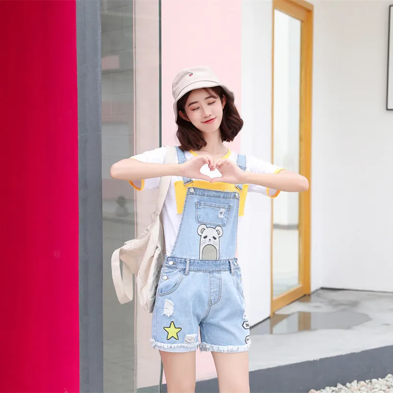 Mori girl cute embroidery bear jeans denim suspenders shorts jumpsuit Salopette femme Summer loose overalls for women
Mori girl cute embroidery bear jeans denim suspenders shorts jumpsuit Salopette femme Summer loose overalls for women