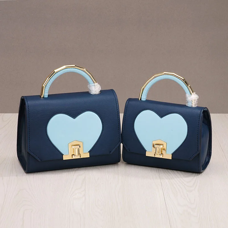 PRAVESDA fashion genuine leather heart design women's handbags cut flap handbags girls crossbody bags
PRAVESDA fashion genuine leather heart design women's handbags cut flap handbags girls crossbody bags