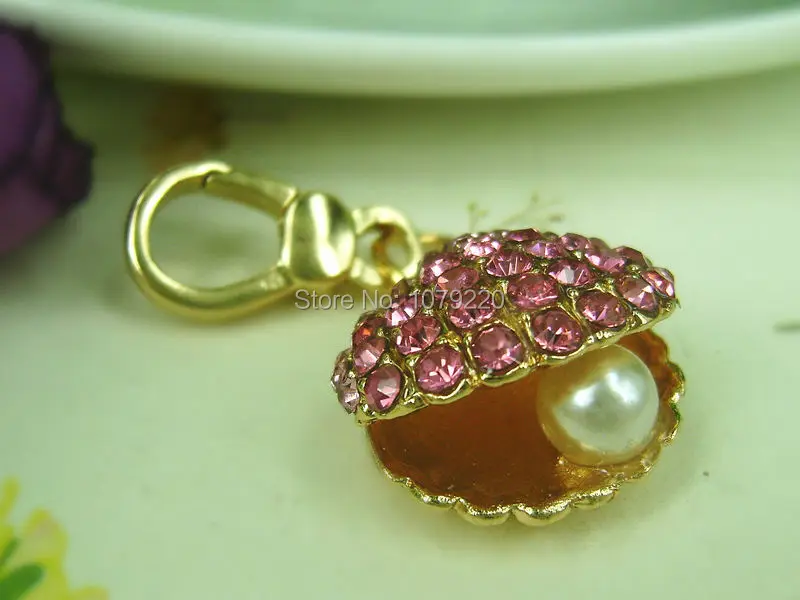 Shell Pearls Small Car Keyring Fashion Jewelry Women Bag Rings Key Crystal Rhinestone Charm Pendant Key Chain Gift moda 2015
Shell Pearls Small Car Keyring Fashion Jewelry Women Bag Rings Key Crystal Rhinestone Charm Pendant Key Chain Gift moda 2015
